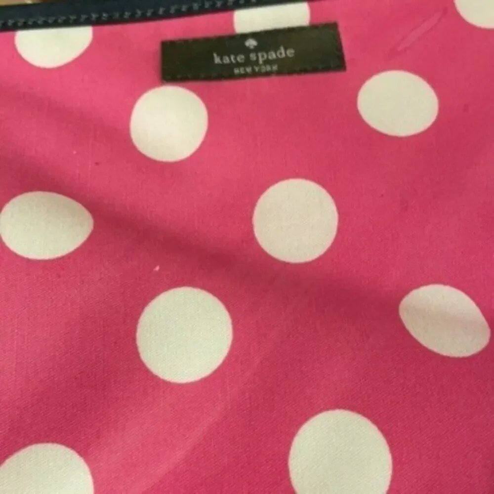 Kate Spade New York cosmetic bag pink with white dots